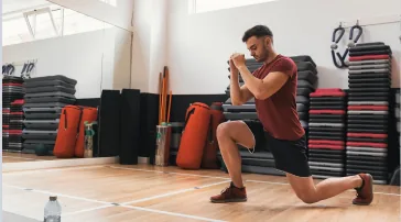 Person performing a lunge exercise