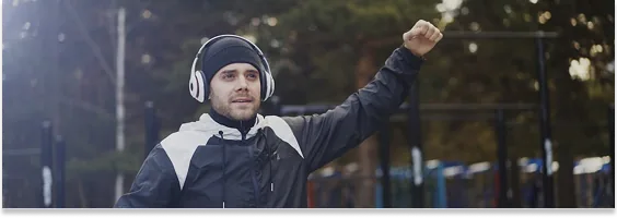 Athlete celebrating outdoors after a workout